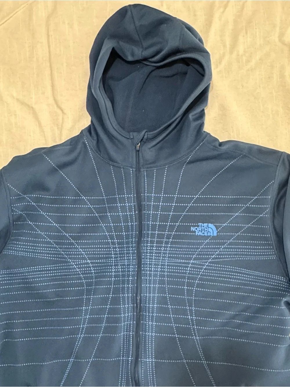 The North Face navy hoodie with light blue dotted pattern